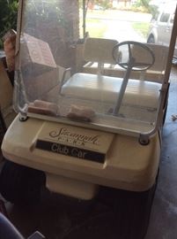 Club Car Golf Cart - has back seat available but has put wooden cargo space on back.