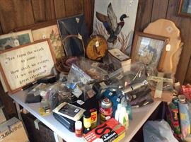 Man Stuff... Ducks, Fishing, flashlights, Cans of who knows what... pictures of ducks and much more.