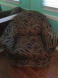 Zebra Print Swivel Chair 
Dimensions: 35"W x 30"H
Asking Price:$125