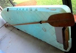 Flatstalker flat boat for getting into and fishing on the flats and other hard to get into places. Comes with attachable solid console with cooler and fish box and giant long double ended paddle--also has trolling motor mount at stern.