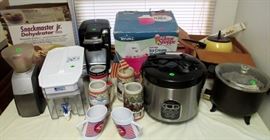 Useful kitchen appliances--Coffee bean grinder, vegetable and rice steamer, crock pot, ice cream maker, Electric fondue pot  and an electric dehydrator. Good names like Keurig, Britta.