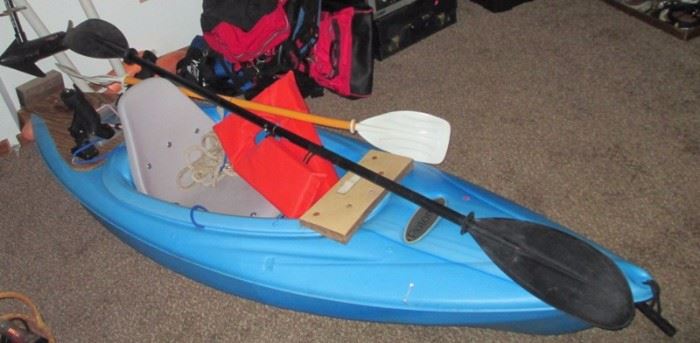 Potomac Kayak. 8 ft long with two paddles and life vest. Also, comes with a 5 HP trolling motor and has a heavy duty motor mount bolted to stern. Also has two outriggers which fasten to holders on the back deck to provide stability when the motor is deployed. Cool Beans!