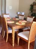 Beautiful Florida style wood dining set with 6 chairs and an extra leaf