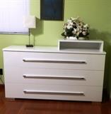 Contemporary white dresser with mirror (not shown) part of Queen bedroom set