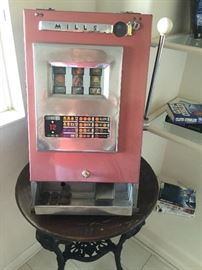 Mills slot machine that has been restored, uses English pence
