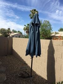 (2) outdoor patio umbrellas