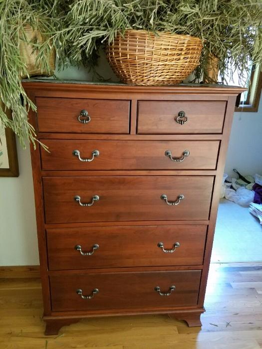 This is a very nice Highboy Dresser....beautiful color/tone. 