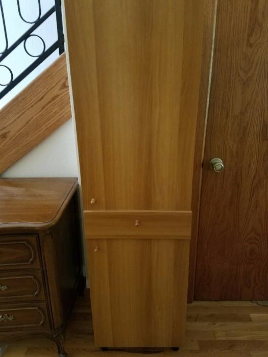 This is an interesting Cabinet.  Drawer in Middle and Top and Bottom open for storage