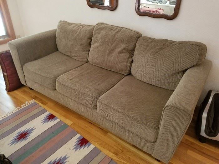 Taupe/grey toned overstuffed sofa
