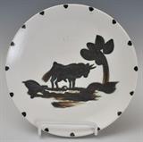 Picasso Madoura Pottery Small Plate
"Taureau sous l'arbre" (Bull under a Tree) The back impressed "EDITION / PICASSO", "MADOURA PLEIN FEU" and scratch-engraved "EDITION / PICASSO". 7 1/2" diameter designed 1952.  Bid at www.fairfieldauction.com today through Wed. July 20th