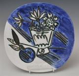 Picasso Madoura Pottery Plate
Bouquet a la pomme (Bunch with apple) The back impressed "EMPRIENTE / ORIGINALE / PICASSO" and "MADOURA PLEIN FEU". 9 3/4" x 9 3/4" designed 1956.  Bid at www.fairfieldauction.com today through Wed. July 20th