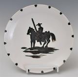Picasso Madoura Pottery Horse and Rider Plate
"Picador" The back impressed "EDITION / PICASSO", "MADOURA PLEIN FEU" and scratch-engraved "EDITION / PICASSO". 7 1/2" diameter designed 1952.  Bid at www.fairfieldauction.com today through Wed. July 20th
