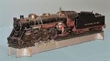 Live Steam Locomotive and Tender
Baltimore & Ohio Railroad with a section of display track, 3" wide allowing running in place 44" long overall, 12 1/2" high overall.  Bid at www.fairfieldauction.com today through Wed. July 20th