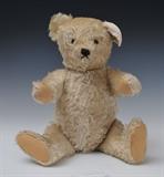 Blonde Steiff Mohair Bear
With growler 19 1/2" high.  Bid at www.fairfieldauction.com today through Wed. July 20th