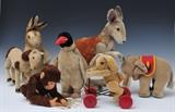 Group of Seven Steiff Stuffed Animals
Comprising a penguin, 13" high, a standing rabbit, 16" high, a Kangaroo with velvet Joey, 18" high, a rabbit pull-toy, 9 1/2" high, an elephant, 8 1/2" high, a horse, 9" high, and a seated monkey, 8 1/2" high..  Bid at www.fairfieldauction.com today through Wed. July 20th