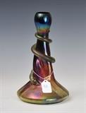 Loetz Style Iridescent Vase
With entwined snake decoration, unsigned. 10 1/4" high, 6 1/2" diameter.  Bid at www.fairfieldauction.com today through Wed. July 20th