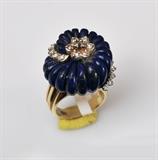 18K Carved Lapis and Diamond Ring
ring size 7 1/2.  Bid at www.fairfieldauction.com today through Wed. July 20th
