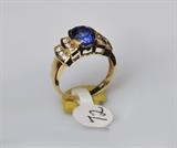 Tanzanite and Diamond 18k Gold Ring
ring size 8 4.0 dwt gross.  Bid at www.fairfieldauction.com today through Wed. July 20th
