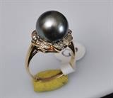 Black Pearl and Diamond 18k Gold Ring
ring size 7 3/4 4.5 dwt gross.  Bid at www.fairfieldauction.com today through Wed. July 20th