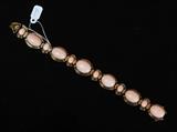 Coral 14k Gold Bracelet
7 1/2" long, 28.7 dwt gross.  Bid at www.fairfieldauction.com today through Wed. July 20th