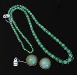 Jade 14k Gold Earrings
1 1/2" diameter, clip-on together with a graduated beaded jade  and crystal necklace, 32" long.  Bid at www.fairfieldauction.com today through Wed. July 20th