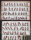 Boxed Set of W. Britain Toy Soldiers
79 Coldstream guards and 4 guard houses in the original divided box. box 14 3/4" x 22" 20th century.  Bid at www.fairfieldauction.com today through Wed. July 20th