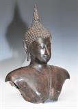 Southeast Asian Bronze Buddha Bust
hollow, with a dark patina overall. 22 1/2" high, 17" wide, 8" deep.  Bid at www.fairfieldauction.com today through Wed. July 20th