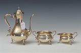 Starr Sterling Silver 3-Piece Coffee Set
Comprising tea pot, sugar bowl and cream pitcher, monogrammed RKC. Pot 8" high, pitcher 2" high, sugar bowl 5 1/4" wide across handles. 22.7 troy ounces weighable..  Bid at www.fairfieldauction.com today through Wed. July 20th