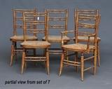 Set of 7 American Fancy Side Chairs
Yellow-painted, faux-bamboo turnings, rush compass seats. 35 1/4" high, 17 3/4" wide, 16 1/4" deep.  Bid at www.fairfieldauction.com today through Wed. July 20th