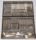 German 800 Silver Flatware Set
124 pieces, with bird mark "W4" and 4-leaf clover marks, comprising: (12) dinner knives, 10" L, (12) dinner forks, 8 1/2" L, (11) table spoons, 8 1/4" L, (11) teaspoons, 5 3/4" L, (12) dessert forks, 7 3/4" L, (12) fish forks, 7" L, (12) fish knives, 8 1/2" L, (12) dessert knives, 8 1/4" L, (12) demitasse spoons, 4 1/4" L, (12) shellfish picks, 3 3/8" L and 6 assorted serving pieces. 152.0 troy ounces weighable..  Bid at www.fairfieldauction.com today through Wed. July 20th