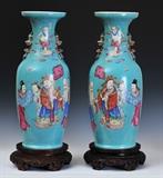 Pair of Chinese Floor Vases
Depicting figures on a blue ground, with fu-lion handles and carved hardwood stands. vases 24 3/4" high x 9 1/2" diameter Probably 20th century.  Bid at www.fairfieldauction.com today through Wed. July 20th
