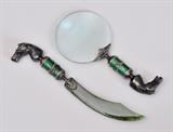 Fabrege Style Magnifying Glass and Letter Opener
With horsehead handles, the letter opener with nephrite blade. bears mark of Faberge 8 1/2" and 10" long.  Bid at www.fairfieldauction.com today through Wed. July 20th