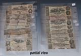 Group of Confederate Currency (26)
including five 1862 $100 notes from Richmond, VA, three $20 notes,five $10 notes and six $5 notes.  Bid at www.fairfieldauction.com today through Wed. July 20th