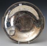 Wolfers Sterling Silver "Signature" Platter
The sides with beaded handles, the center impressed BRUXELLES 1959-1961 surrounded by inscribed signatures, the foot stamped J29j, A925 2 1/4" high, 14 1/4" diameter across handles 27.0 ozt.  Bid at www.fairfieldauction.com today through Wed. July 20th