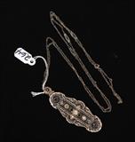 Victorian 14k Gold Filigree Diamond Pendant/Brooch
2 1/2" long on a 28" 14k gold chain 5.6 dwt gross.  Bid at www.fairfieldauction.com today through Wed. July 20th