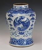 Chinese Blue and White Dragon Vase
19th century Depicting dragons and phoenixes, the base with four character marks. 14" high, approximately 10" diameter.  Bid at www.fairfieldauction.com today through Wed. July 20th