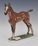 Two Rosenthal Porcelain Animals
A foal and an elk, the base of the foal impressed "Alb.Hinrich Hussmann"; the elk with detachable antlers. Elk: 15" high x 16" long x 9" wide Foal: 10" high x 9 3/4" long x 2 3/4" wide.  Bid at www.fairfieldauction.com today through Wed. July 20th