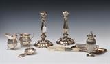 Group Continental 800 Silver
31 pieces, comprising a pair of hollow candlesticks, 9 1/4" high, a chased cream pitcher and matching waste bowl, a reeded caster. 6 1/2" high, a small rectangular tray, 5" x 9", a strainer, 5 1/4" long, (12) fruit knives and (11) fruit forks marked WELLNER, 6 1/2" and 5 1/2" L; together with a mother-of-pearl letter opener with silver mount, 8 1/4" long. 47.0 troy ounces weighable.  Bid at www.fairfieldauction.com today through Wed. July 20th