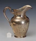 AG Schultz Sterling Silver Water Pitcher
Monogrammed DCC, pattern # 401 10" high 27.3 troy ounces.  Bid at www.fairfieldauction.com today through Wed. July 20th