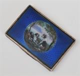French Enameled Patch Box
the lid centering 3 hounds on a cobalt-blue ground, lip of lid marked "FRANCE." 3/8" high x 2 7/8" wide x 2" deep.  Bid at www.fairfieldauction.com today through Wed. July 20th