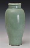 Chinese Celadon Glazed Vase
With faint stylized lotus decoration, drilled. 13 3/4" high x 6 3/4" diameter Probably late 19th century.  Bid at www.fairfieldauction.com today through Wed. July 20th