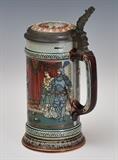 Mettlach Stein
marked underneath model 2391 9" high overall dated 1898.  Bid at www.fairfieldauction.com today through Wed. July 20th