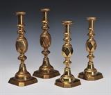 Two Pairs of Brass Candlesticks
King of Diamond pattern, otherwise unmarked 12 1/2" and 14" high.  Bid at www.fairfieldauction.com today through Wed. July 20th