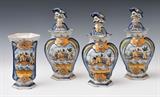 French Faience Garniture
Comprising three covered urns and a vase, all of hexagonal section. 8 3/4" and 12 1/4" high.  Bid at www.fairfieldauction.com today through Wed. July 20th