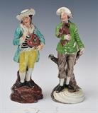Two Continental Porcelain Figures
18th/19th century Depicting two figures standing with tree stumps, unmarked Each approximately 8 1/4" high.  Bid at www.fairfieldauction.com today through Wed. July 20th