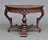 Victorian Renaissance Revival Game Table
Hinged demilune foldover top with red baize lining, skirt with single drawer. 30" high, 42 3/4" wide, 21" deep circa 1875.  Bid at www.fairfieldauction.com today through Wed. July 20th