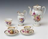 Meissen Tea Service
Comprising a tea pot, cream pitcher, waste bowl, two cups and two saucers, all with gilt band border.  Height of tea pot 9 3/4".  Bid at www.fairfieldauction.com today through Wed. July 20th