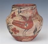 Zia Polychrome Pottery Pot
With stylized birds and flowers. 9" high, 9" diameter.  Bid at www.fairfieldauction.com today through Wed. July 20th