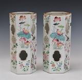 Pair of Chinese Hat Stands
Of hexagonal section and in the Famille Rose palette, with pierced sides. Each with square red mark underneath. 11" high, 4 1/2" wide, 5" deep.  Bid at www.fairfieldauction.com today through Wed. July 20th