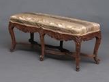 Louis XV Style Carved Bench
Double-X stretcher, over-upholstered seat. 18" high, 43" long, 15" deep.  Bid at www.fairfieldauction.com today through Wed. July 20th